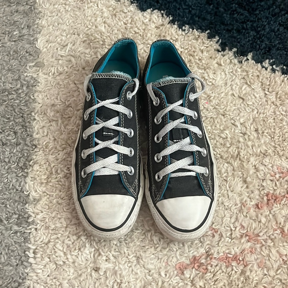 Black and blue, low rise converses.